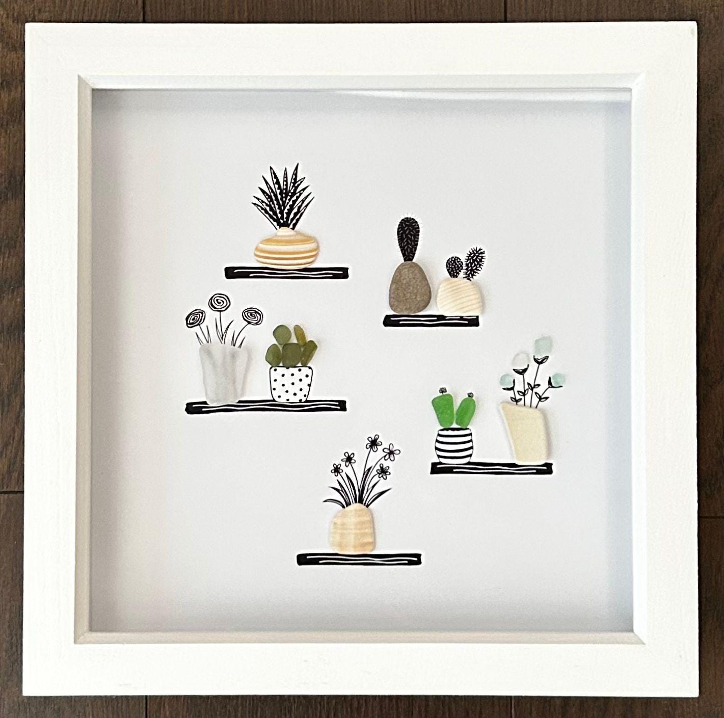 Sea Glass Flower & Pebble Plant Shelf Art – Handmade Coastal Wall Decor – Quirky Nature Picture