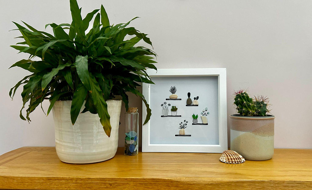 Sea Glass Flower & Pebble Plant Shelf Art – Handmade Coastal Wall Decor – Quirky Nature Picture