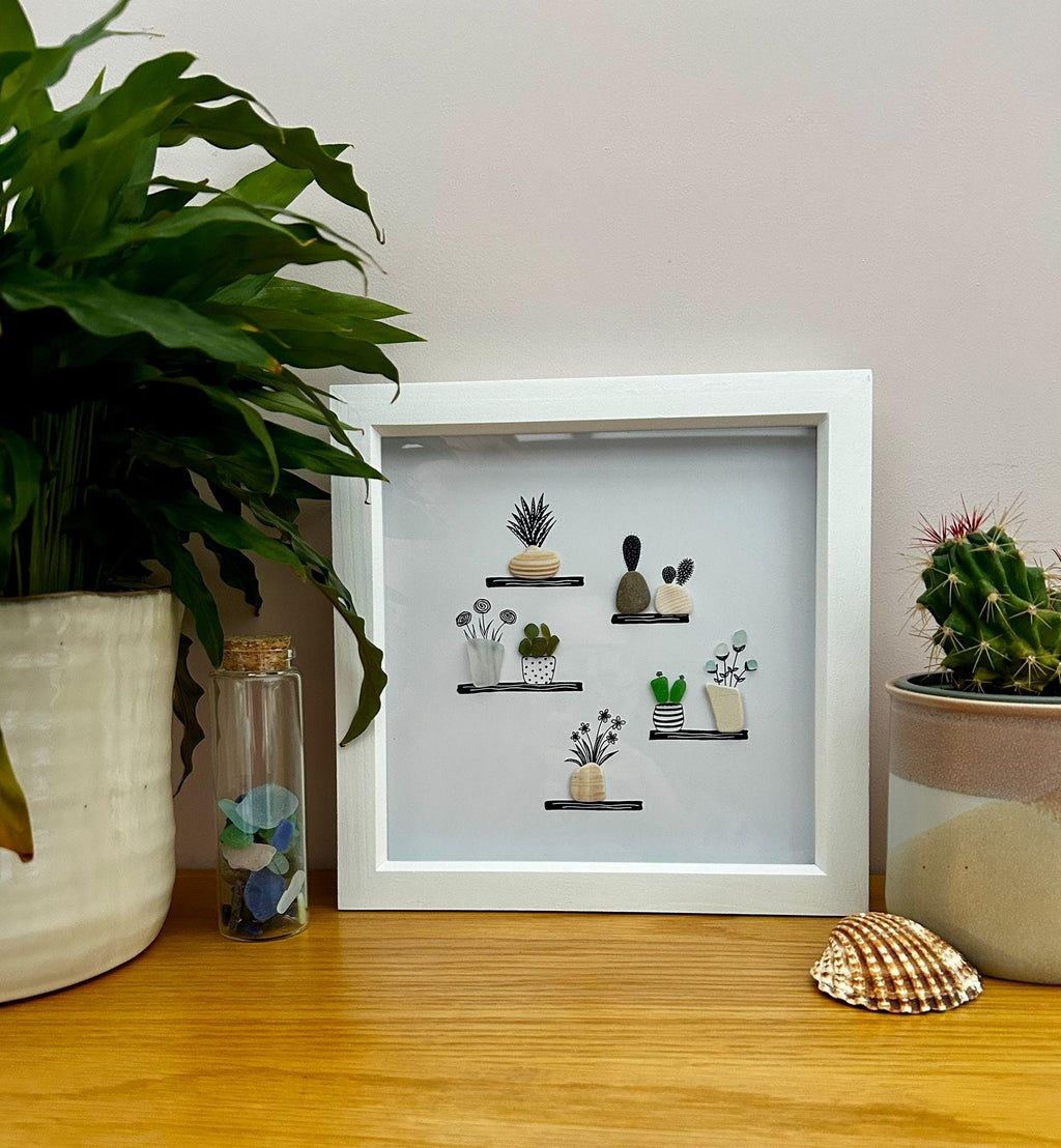 Sea Glass Flower & Pebble Plant Shelf Art – Handmade Coastal Wall Decor – Quirky Nature Picture
