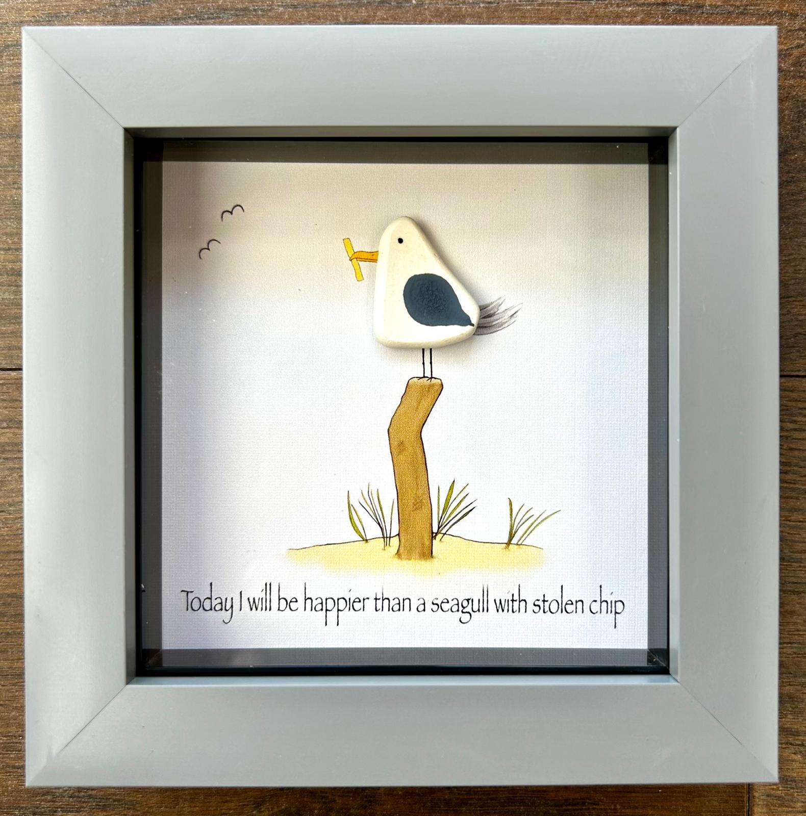 Pebble Seagull Stealing Chip Art – Quirky Handmade Coastal Wall Picture – Humorous UK Gift