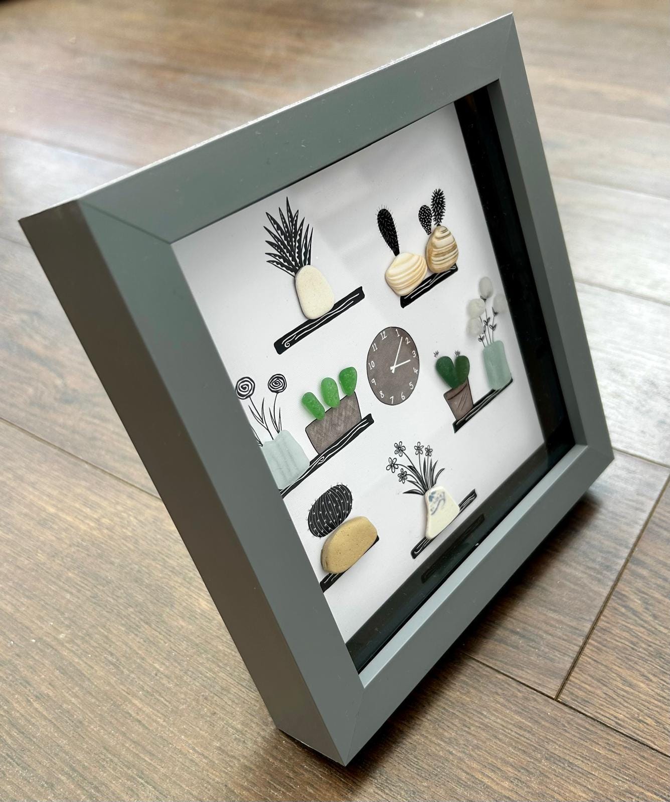 Sea Glass Plant Shelf Art: Coastal Pebble Flower Picture