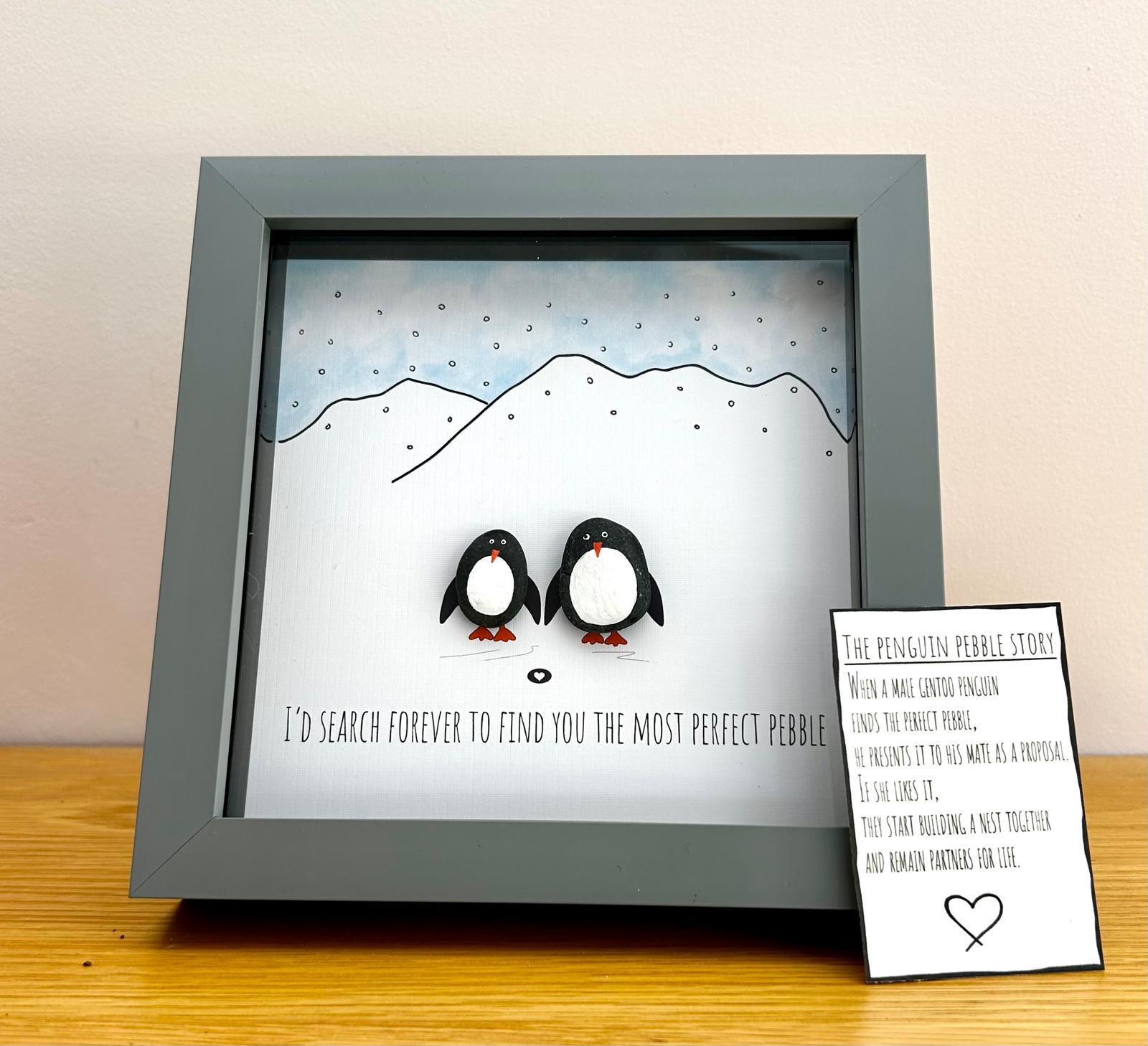 Pebble Penguins: Romantic Coastal Decor in 7x7 Frame – Sweet Quote