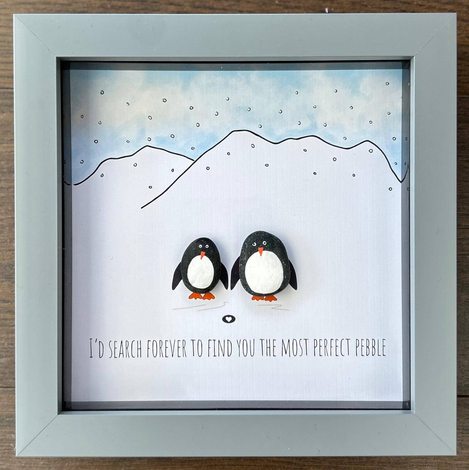 Pebble Penguins: Romantic Coastal Decor in 7x7 Frame – Sweet Quote