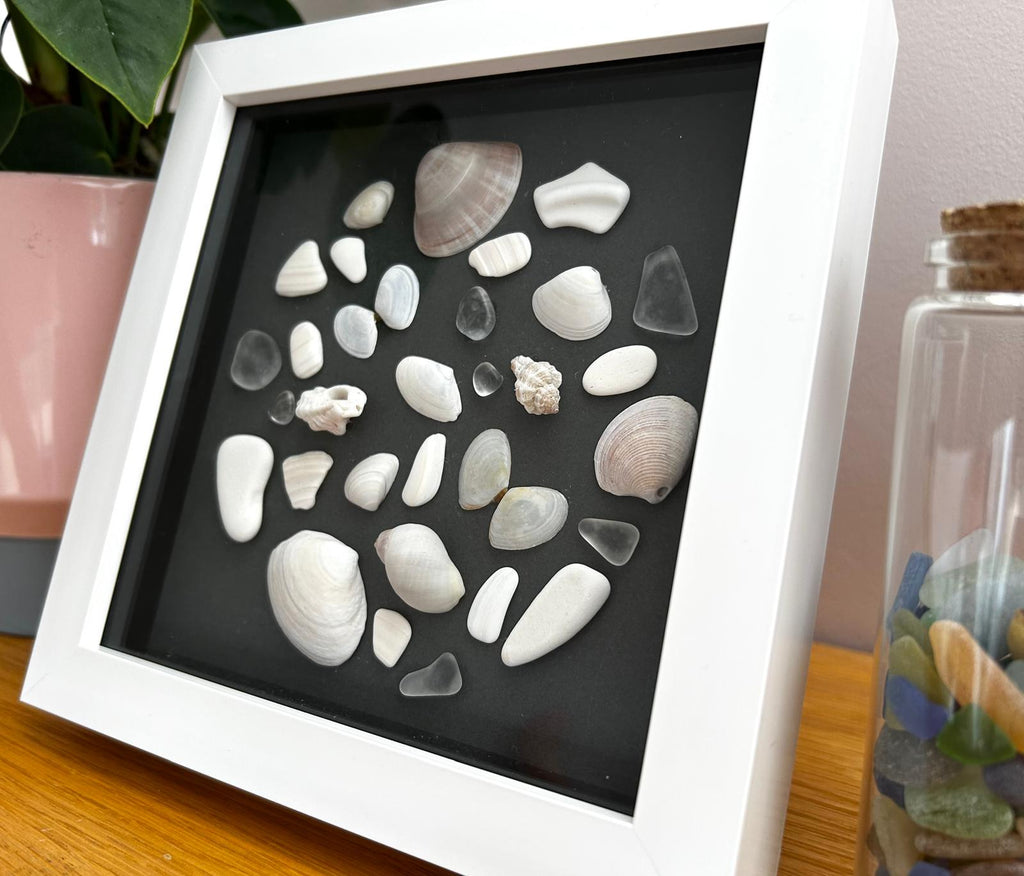 Handmade Cornish Sea glass, shells & pottery: Coastal Wall Decor in White Frame circle design